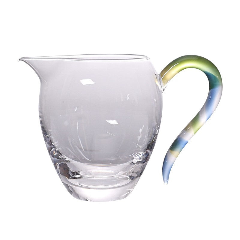 Thick-Base Glass Gongdao Cup with yellow, blue and green twisted glass handle, on white