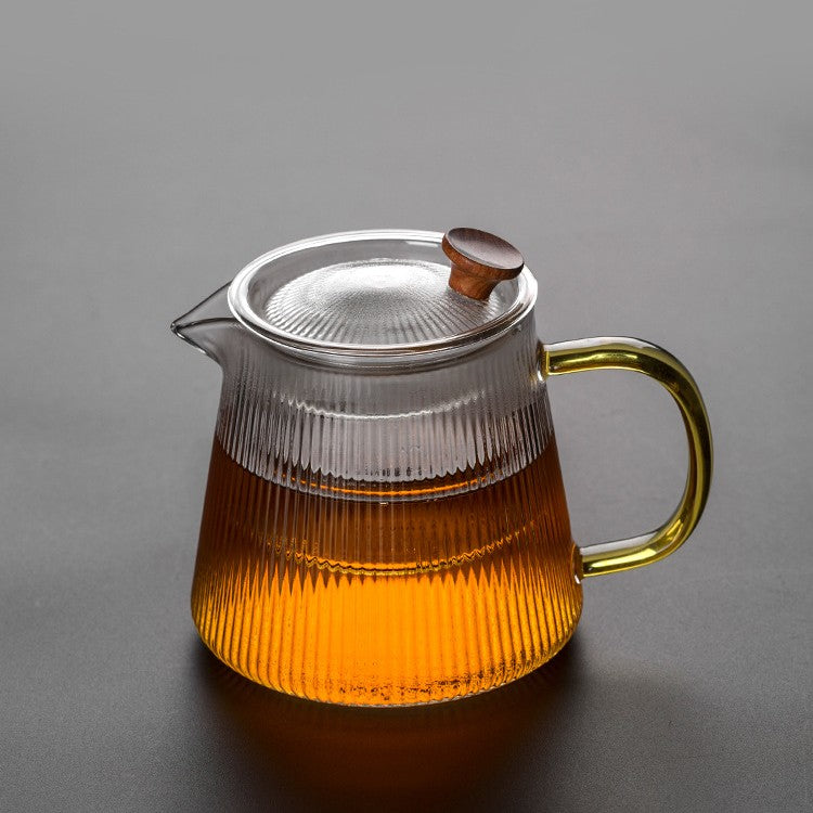 800ml Glass Teapot with Removable Infuser, ribbed body filled with amber tea, walnut lid knob