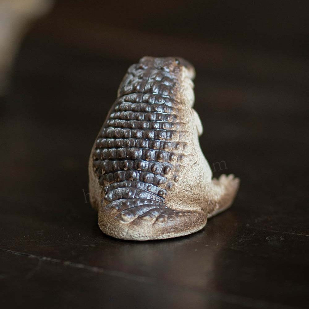 Back view of the crocodile tea pet showing the hand-coloured scale pattern