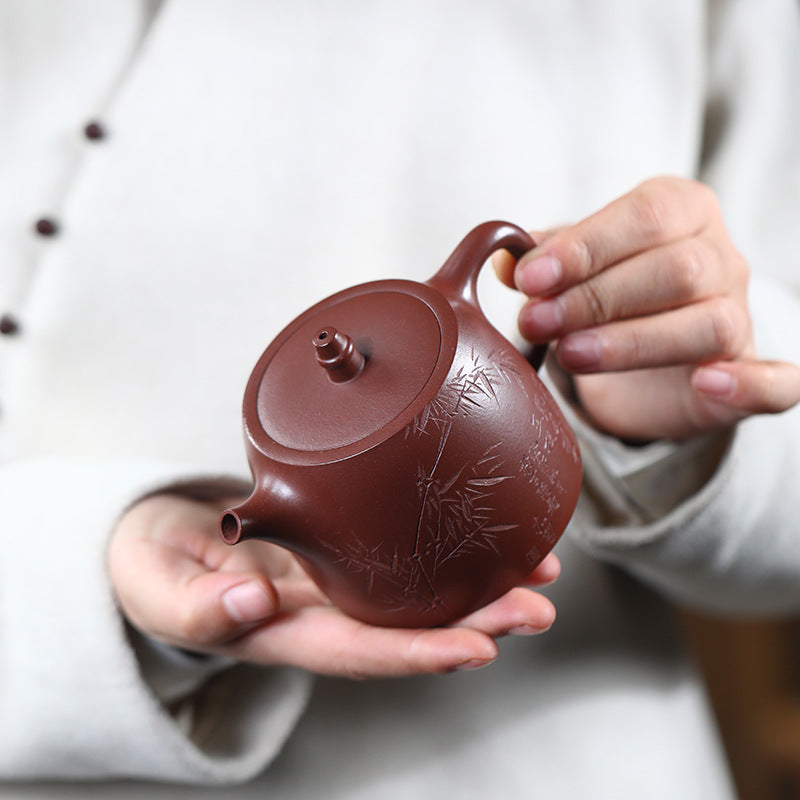 Top view of the Bamboo Handuo teapot showing the bell-shaped knob and lid