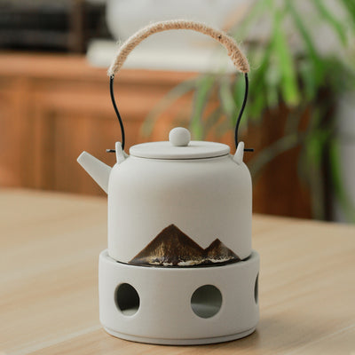Original Ore Ceramic Teapot showcasing built-in infuser for easy tea brewing.