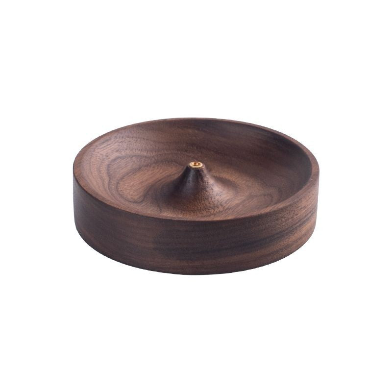 Walnut incense stick holder, round dish with cone centre, on a white background