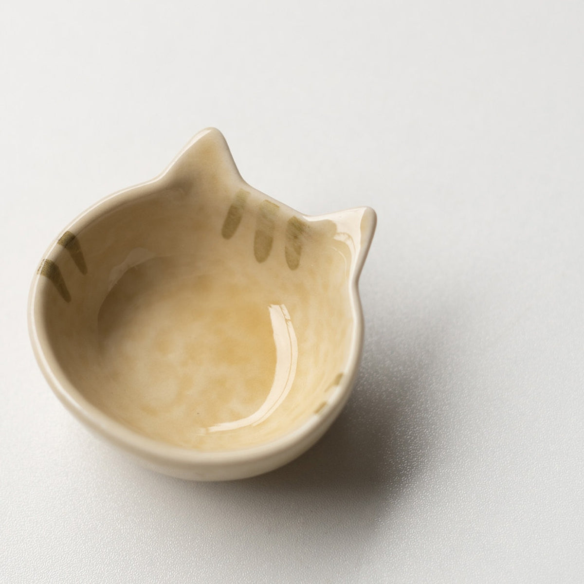 Cream cat ceramic mini dish in ginger, cat head shape, 6 cm
