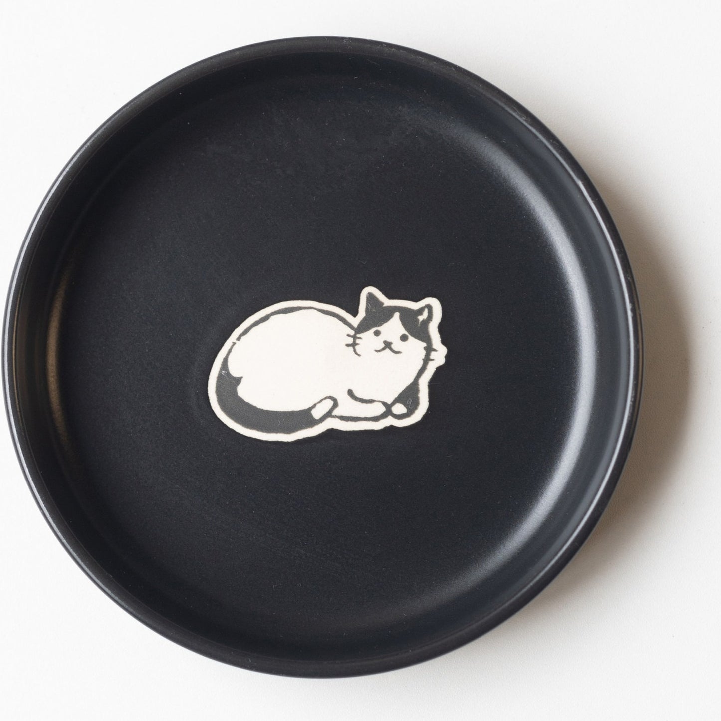 Black cat saucer, 12.4 cm, sleeping cat motif