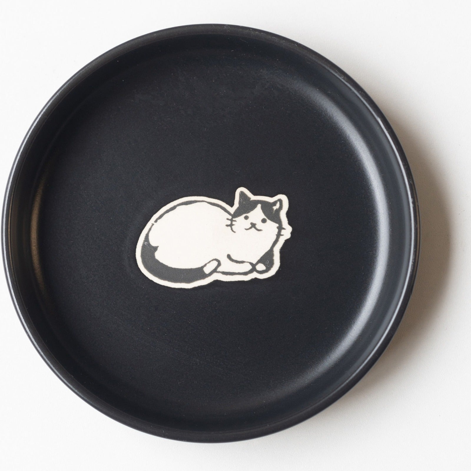 Black cat saucer, 12.4 cm, sleeping cat motif